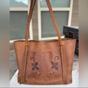 SOLD.   Gypsy Belt Co Handcrafted Tan Leather Tote with Floral Design